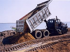 Dump truck on Laurence Harbor, NJ beach